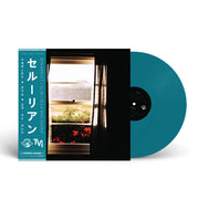 Blue vinyl edition of Cerulean by Benaddict, Slim & Ella Mae Sueref, featuring Japanese-style obi strip and cover artwork of a window with flowers and sea view.
