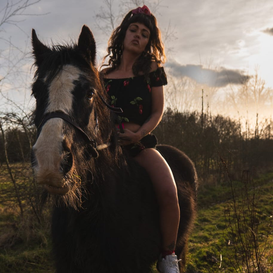 Ella Mae riding a horse