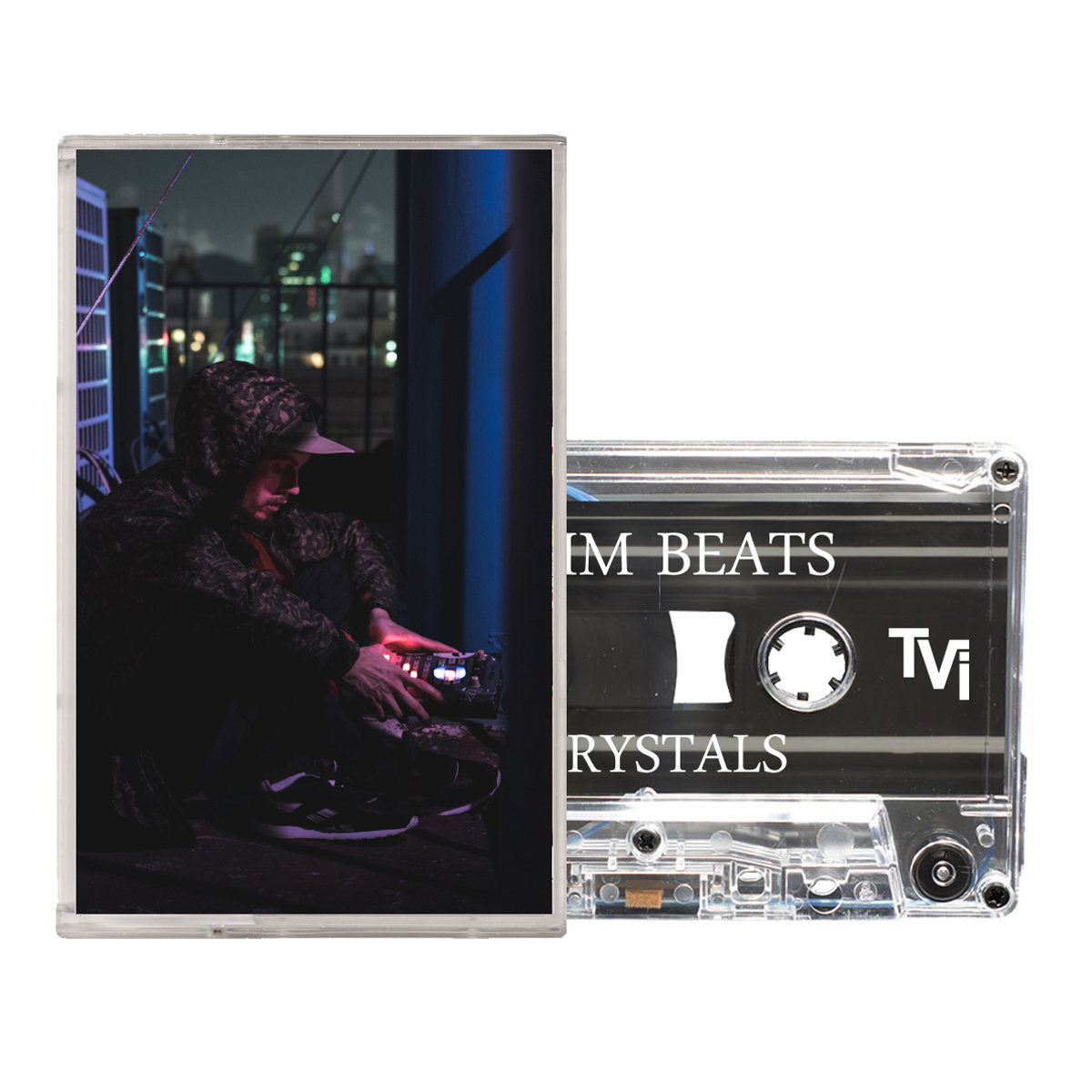 Cassette tape and cover for Klim Beats' Crystals release, featuring moody street photography and minimal black cassette design.
