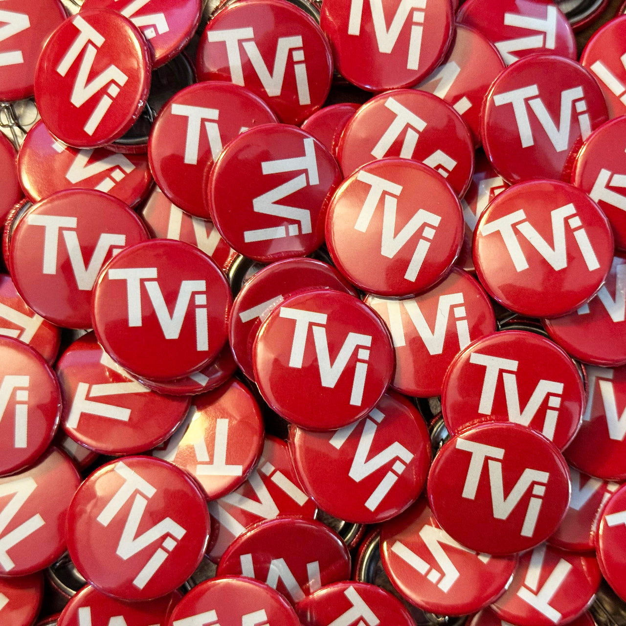 TVI (Red Pin Badge)